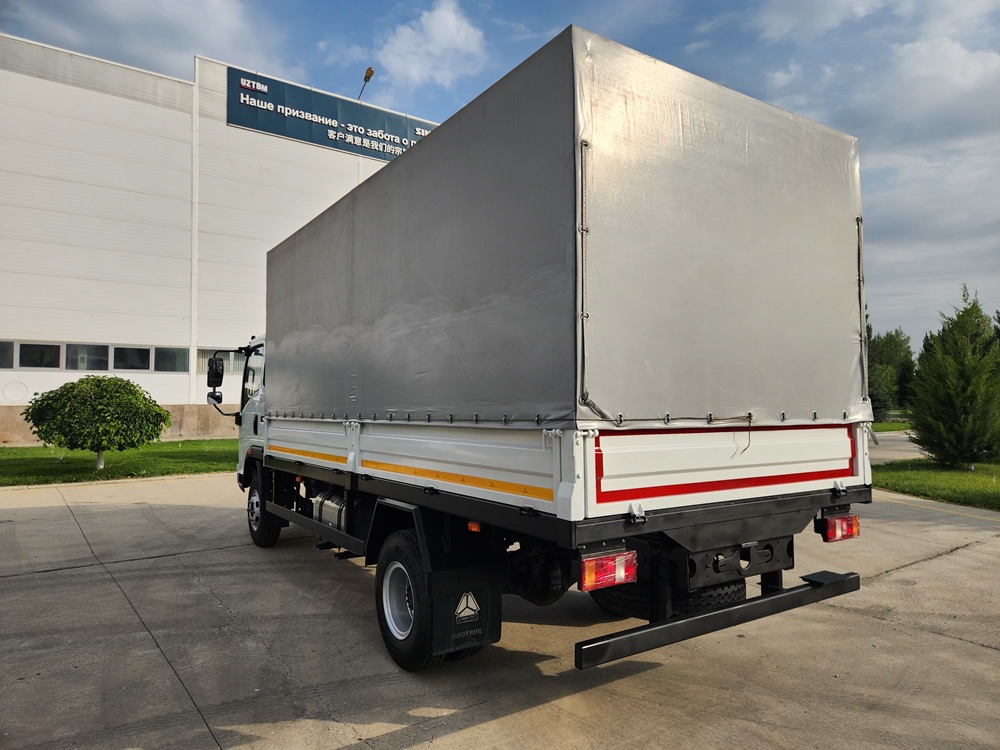 Бортовой автомобиль с тентом Homan-H3 4x2 - 6 т / 24 куб.м